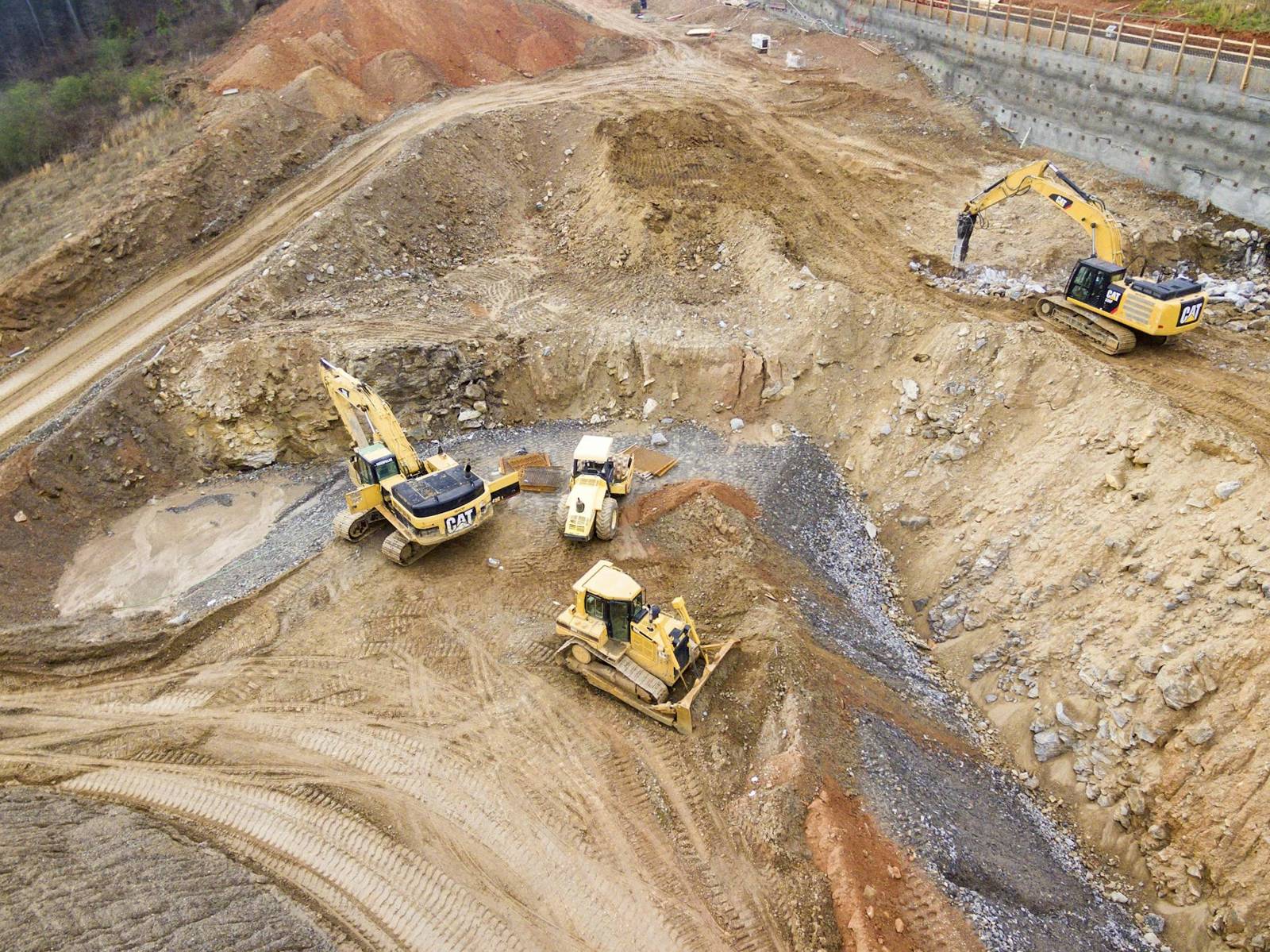 Aerial view of heavy equipment on an earthworks site